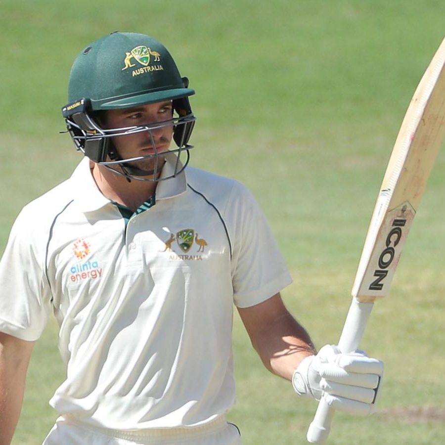Matthew Spoors raising his bat for a Cricket Australia XI