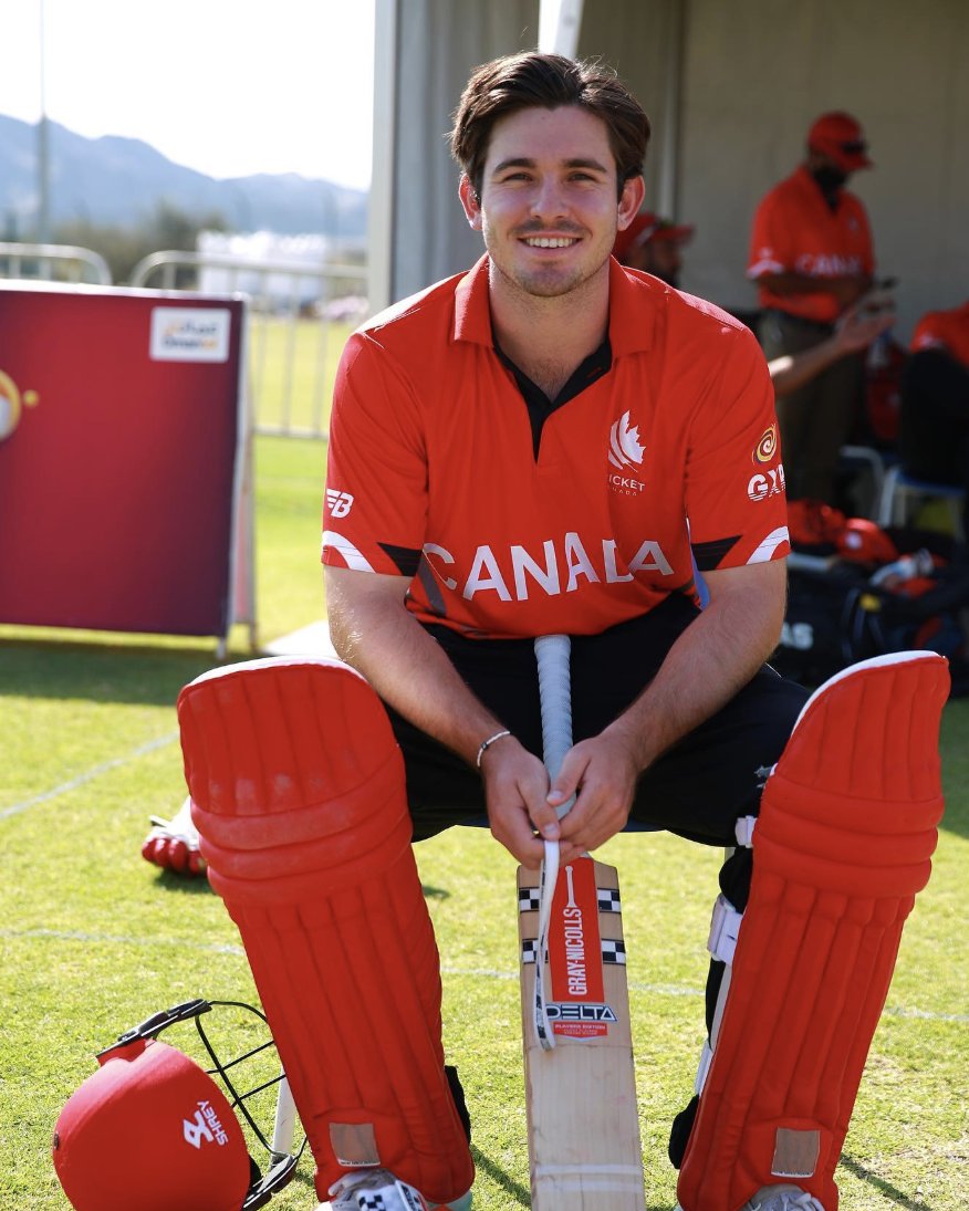 Matthew Spoors in Canada kit, sitting padded up with his bat